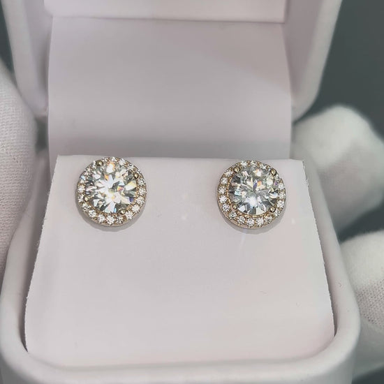 Load and play video in Gallery viewer, Feliz VVS1 Round Halo Moissanite 14K Gold Stud Earrings
