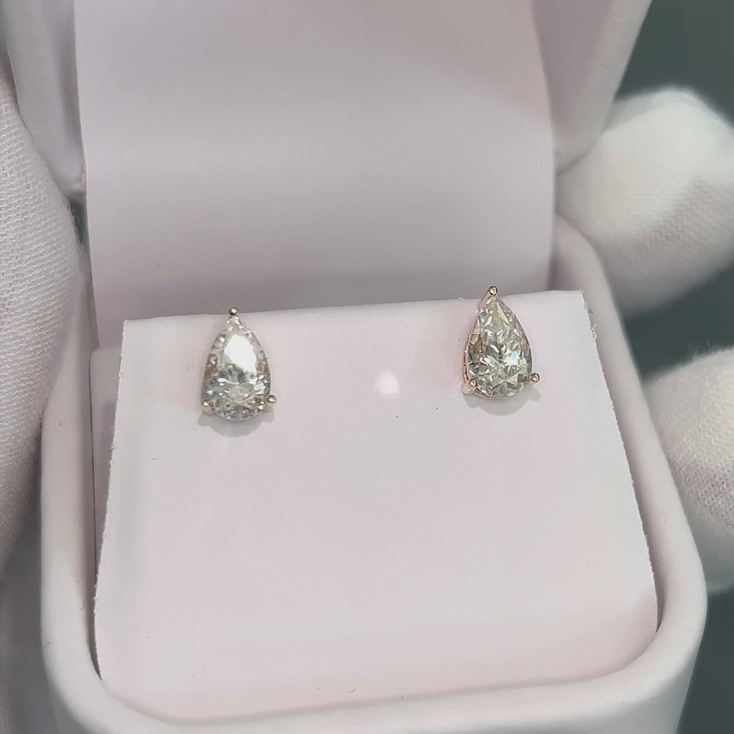 Load and play video in Gallery viewer, Classica Pear Cut Moissanite Solitaire Stud Earrings

