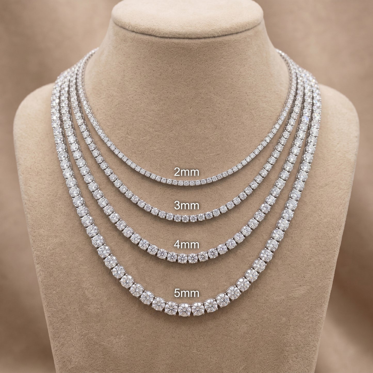 Set of diamond necklaces on a mannequin bust with size labels.