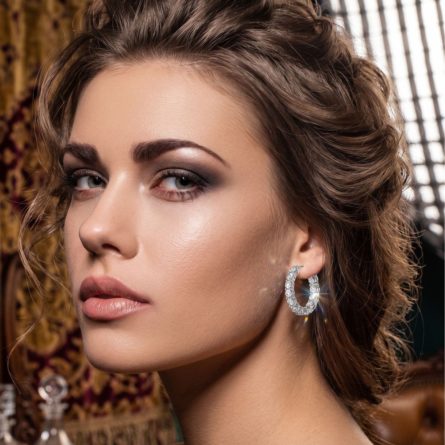 a woman wearing white gold moissanite diamond hoop earrings in 25mm size